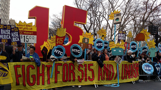 NYC rally to raise the minimum wage. Photo CC SA 2.0 courtesy of The All-Nite Images. 
